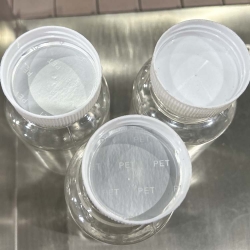 塑料瓶铝箔封口剔除机构的介绍